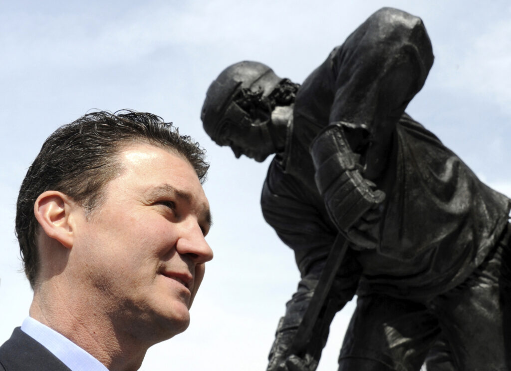 Pittsburgh Penguins' hockey legend Mario Lemieux speaks to the media and crowd after "Le Magnifique", a statue honoring his career was unveiled at Consol Energy Center in Pittsburgh, Pennsylvania on March 7, 2012